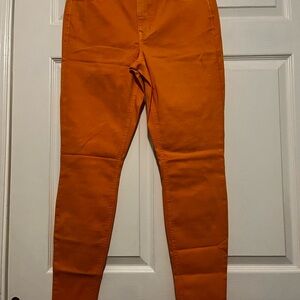 Maurices Orange Skinny Jeans